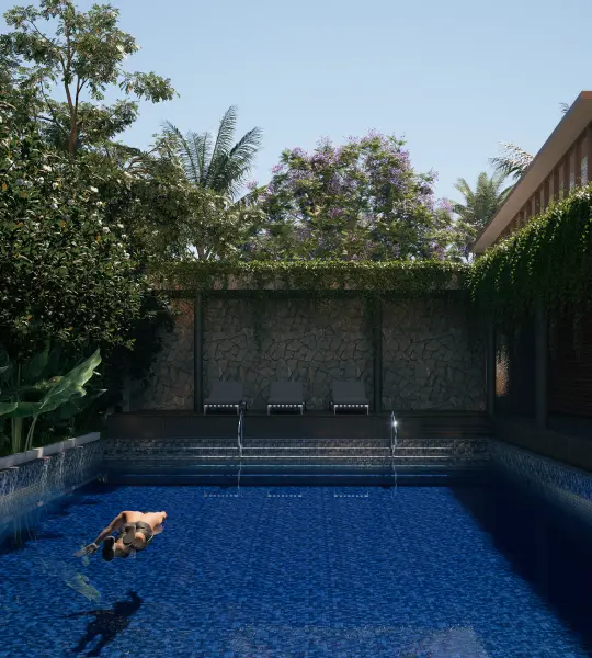 Outdoor pool surrounded by tropical greenery